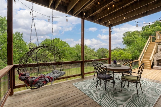 45 Saddle Rock Rdg, Wimberley, TX 78676 - wooden terrace featuring outdoor dining space and stairs