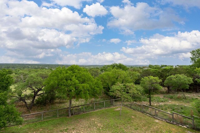 45 Saddle Rock Rdg, Wimberley, TX 78676 - view of yard featuring fence, a rural view, and a forest view
