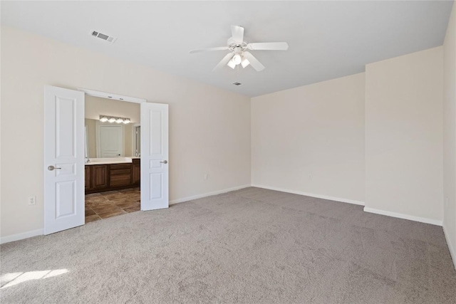 504 Deer Meadow Cir, Georgetown, TX 78633 - unfurnished room with carpet floors, a ceiling fan, and baseboards