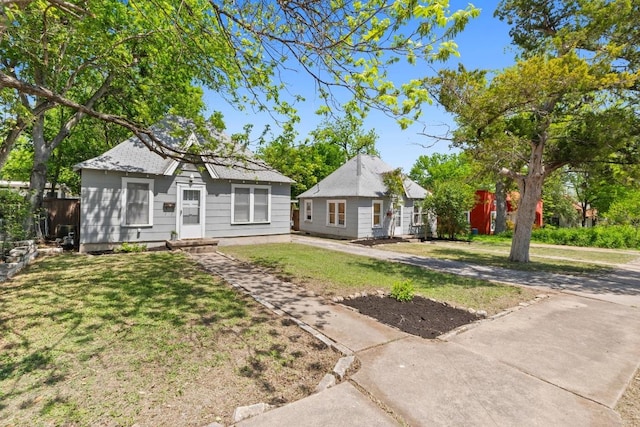 504 E 38 1/2 St Unit 504, 504B, 506, Austin, TX 78751 - view of front of property featuring a front lawn and entry steps