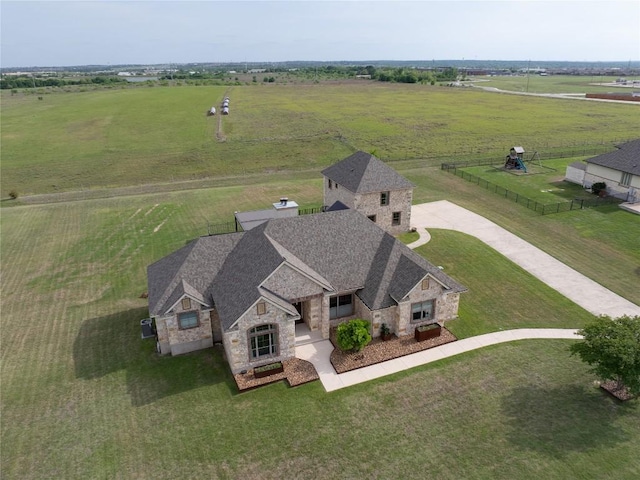 birds eye view of property featuring a rural view