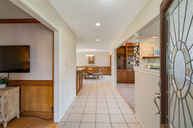21407 High Dr, Lago Vista, TX 78645 - entrance foyer featuring a chandelier and baseboards