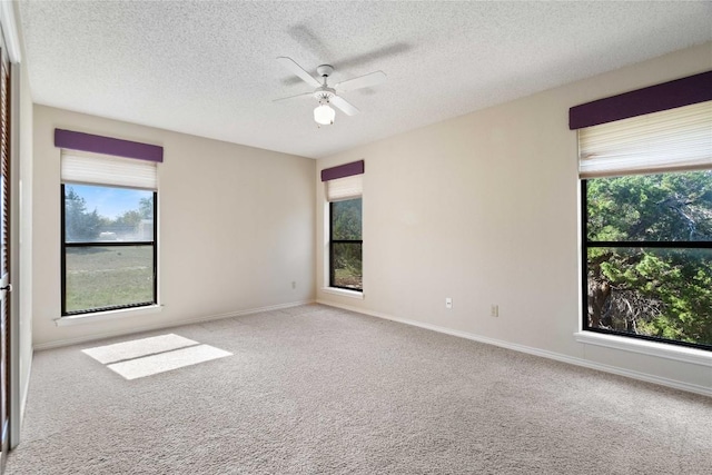 21407 High Dr, Lago Vista, TX 78645 - carpeted spare room with a ceiling fan and a textured ceiling