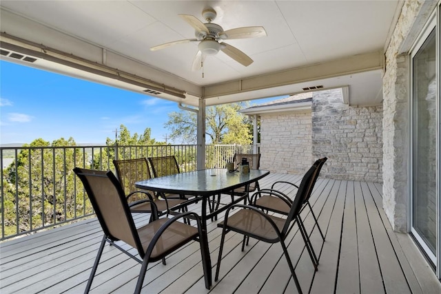 21407 High Dr, Lago Vista, TX 78645 - deck with ceiling fan and outdoor dining space