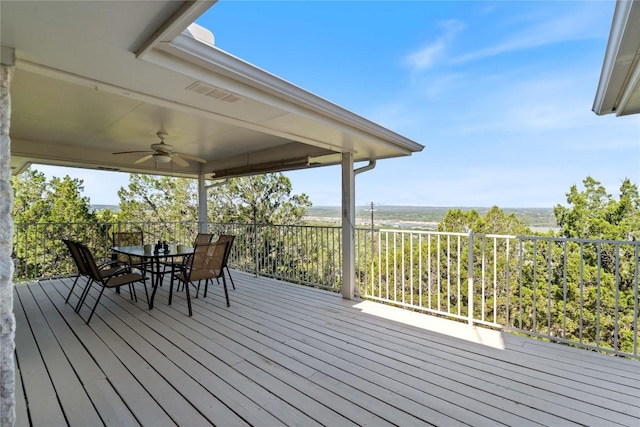 21407 High Dr, Lago Vista, TX 78645 - deck with outdoor dining area and ceiling fan