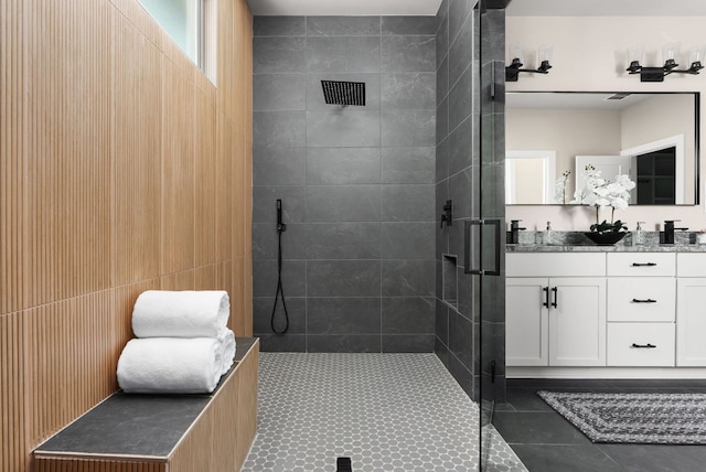 347 Stars And Stripes, Fischer, TX 78623 - full bathroom with a tile shower, double vanity, and tile patterned floors