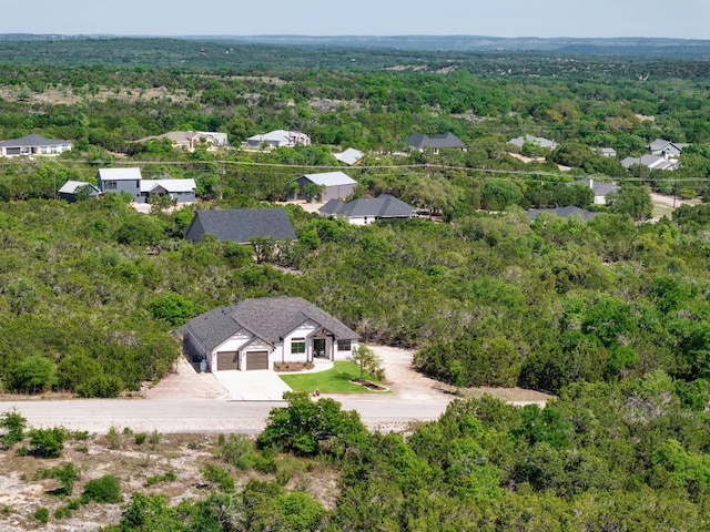347 Stars And Stripes, Fischer, TX 78623 - view of subject property featuring a forest
