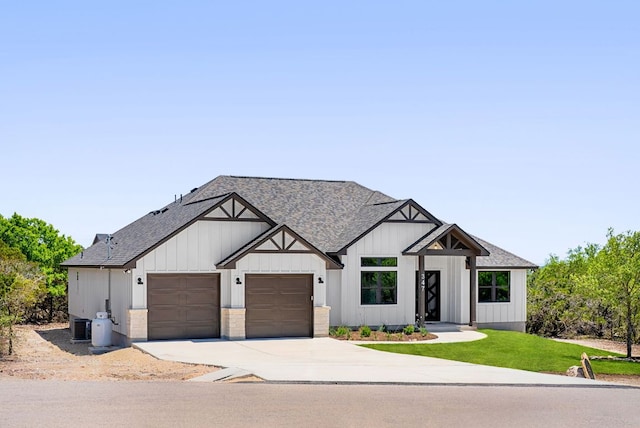 347 Stars And Stripes, Fischer, TX 78623 - modern farmhouse featuring concrete driveway, roof with shingles, an attached garage, and cooling unit