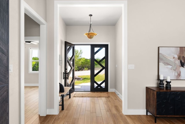 347 Stars And Stripes, Fischer, TX 78623 - entrance foyer with light wood-style flooring and baseboards