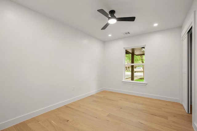 5406 Emerald Forest Dr, Austin, TX 78745 - unfurnished bedroom with visible vents, baseboards, a closet, recessed lighting, and light wood-style flooring