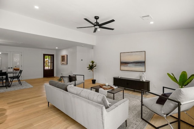 5406 Emerald Forest Dr, Austin, TX 78745 - living room featuring visible vents, baseboards, ceiling fan, recessed lighting, and light wood-type flooring