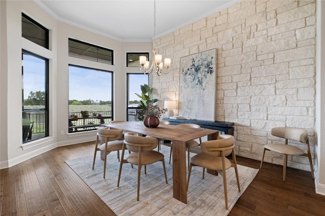 2325 High Lonesome, Leander, TX 78641 - dining space featuring a chandelier, wood-type flooring, and ornamental molding