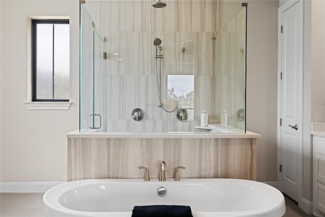 2325 High Lonesome, Leander, TX 78641 - bathroom featuring a freestanding bath, a stall shower, and vanity