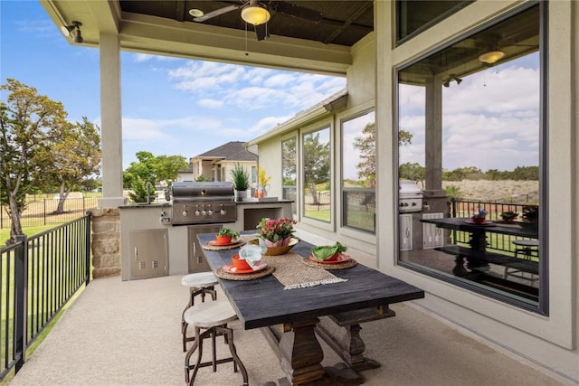 2325 High Lonesome, Leander, TX 78641 - view of patio with area for grilling, ceiling fan, and outdoor dining area