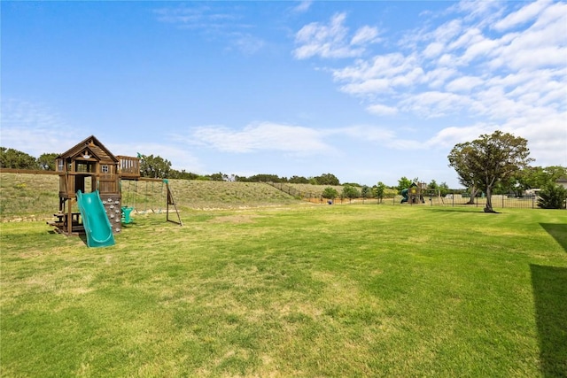 2325 High Lonesome, Leander, TX 78641 - view of green lawn featuring a playground