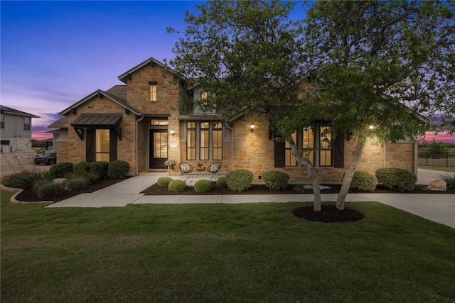 2325 High Lonesome, Leander, TX 78641 - view of front of home with stone siding and a front lawn