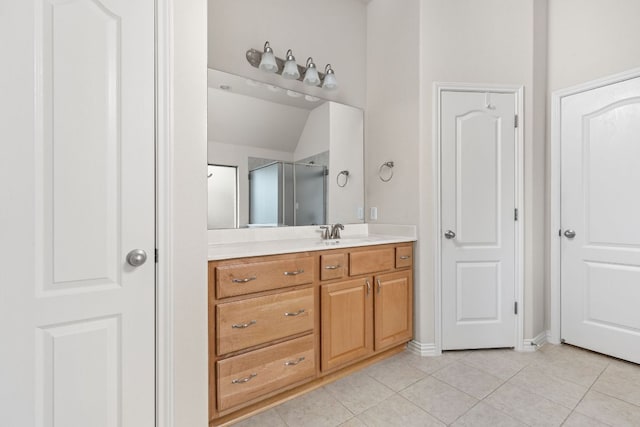 217 Monahans Dr, Georgetown, TX 78628 - full bath with vanity, tile patterned flooring, and a shower with shower door