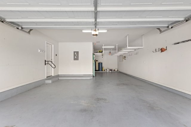 217 Monahans Dr, Georgetown, TX 78628 - garage with electric panel and a garage door opener