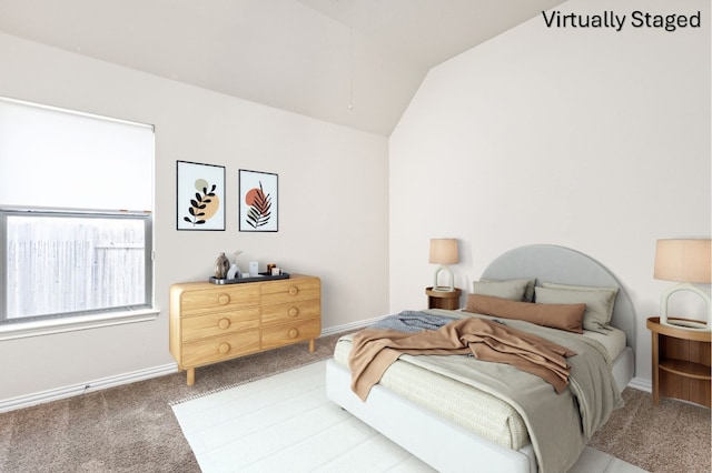 217 Monahans Dr, Georgetown, TX 78628 - carpeted bedroom with lofted ceiling and baseboards