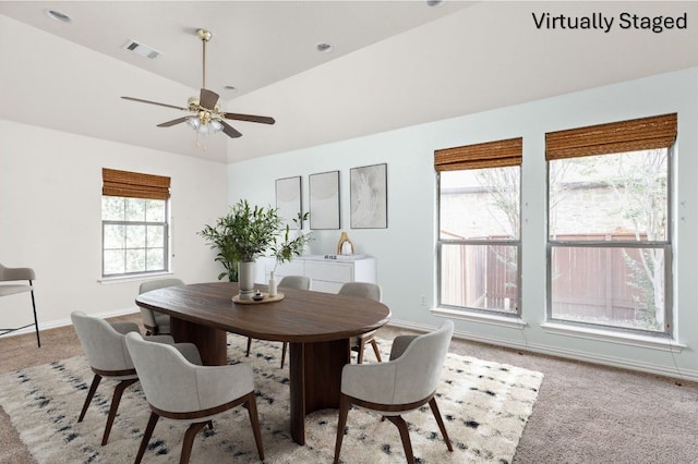 217 Monahans Dr, Georgetown, TX 78628 - dining area with light colored carpet and a ceiling fan