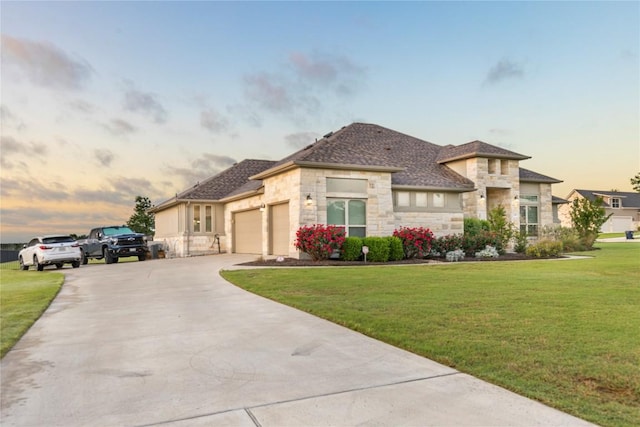 2560 Square Nail Cv, Leander, TX 78641 - view of front of house featuring stone siding, a yard, an attached garage, and concrete driveway