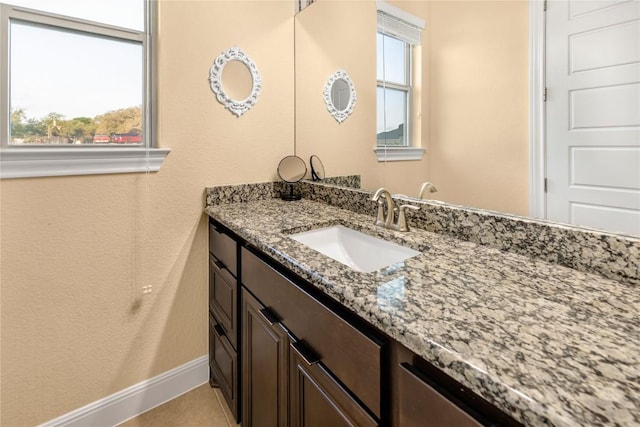 2560 Square Nail Cv, Leander, TX 78641 - bathroom featuring vanity and baseboards