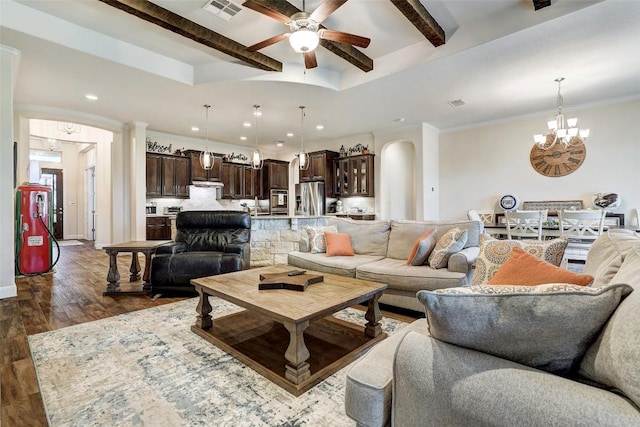 2560 Square Nail Cv, Leander, TX 78641 - living area with a chandelier, dark wood-style floors, ceiling fan, arched walkways, and beamed ceiling