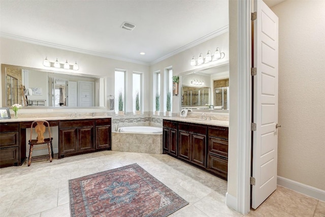 2560 Square Nail Cv, Leander, TX 78641 - bathroom with ornamental molding, a garden tub, two vanities, tile patterned floors, and an enclosed shower