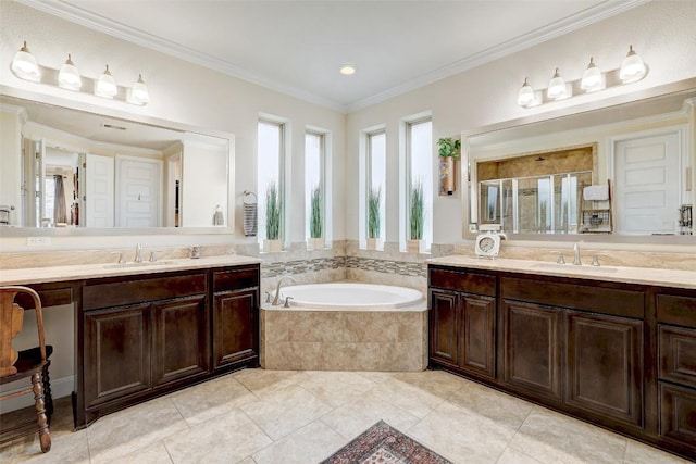 2560 Square Nail Cv, Leander, TX 78641 - full bath featuring two vanities, a garden tub, a shower stall, tile patterned flooring, and ornamental molding