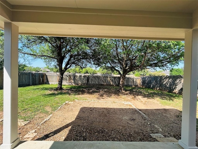 view of yard with a fenced backyard