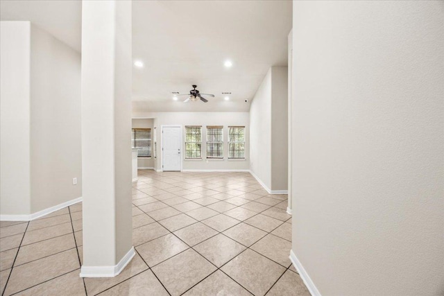 145 Moon Mist Dr, Bastrop, TX 78602 - empty room with light tile patterned floors, recessed lighting, baseboards, and a ceiling fan