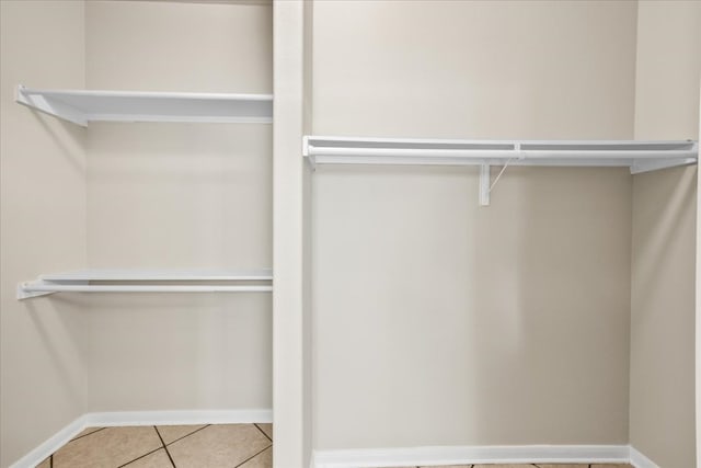 145 Moon Mist Dr, Bastrop, TX 78602 - walk in closet with tile patterned floors