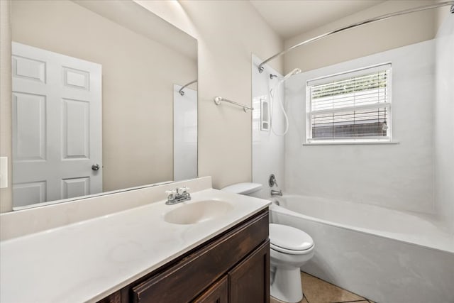 bathroom featuring shower / bathtub combination, toilet, vanity, and tile patterned floors