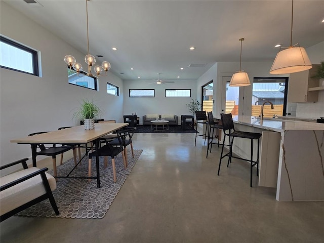 5303 Grover Ave Unit 1, Austin, TX 78756 - dining area featuring concrete floors, healthy amount of natural light, recessed lighting, and ceiling fan