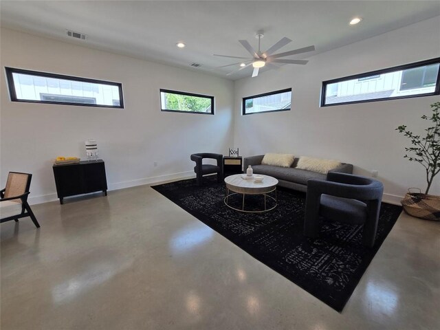 5303 Grover Ave Unit 1, Austin, TX 78756 - living room with finished concrete floors, recessed lighting, and a ceiling fan