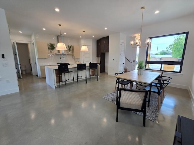5303 Grover Ave Unit 1, Austin, TX 78756 - dining room featuring finished concrete flooring, a chandelier, and recessed lighting