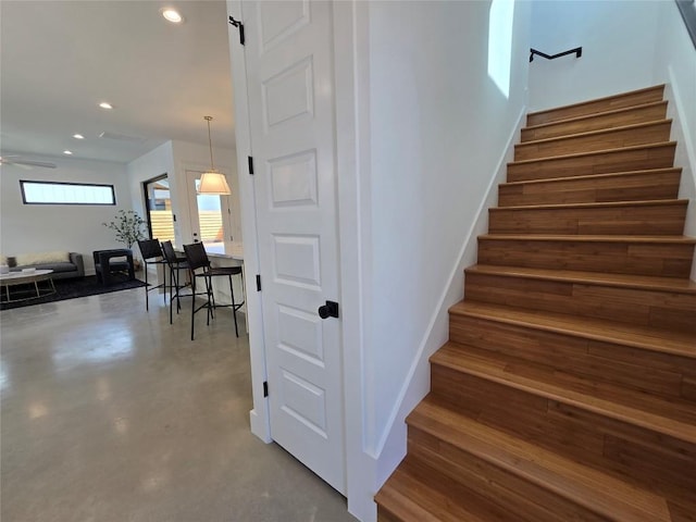 5303 Grover Ave Unit 1, Austin, TX 78756 - staircase featuring recessed lighting, a ceiling fan, concrete floors, and a barn door