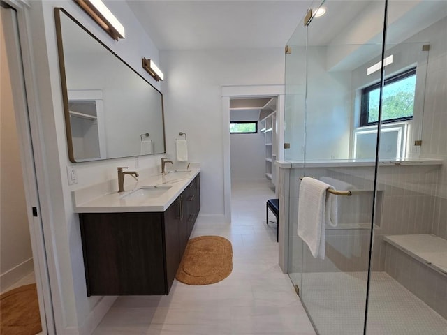 5303 Grover Ave Unit 1, Austin, TX 78756 - full bathroom with healthy amount of natural light, double vanity, and an enclosed shower