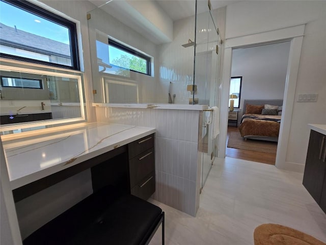 5303 Grover Ave Unit 1, Austin, TX 78756 - ensuite bathroom featuring vanity and a shower stall