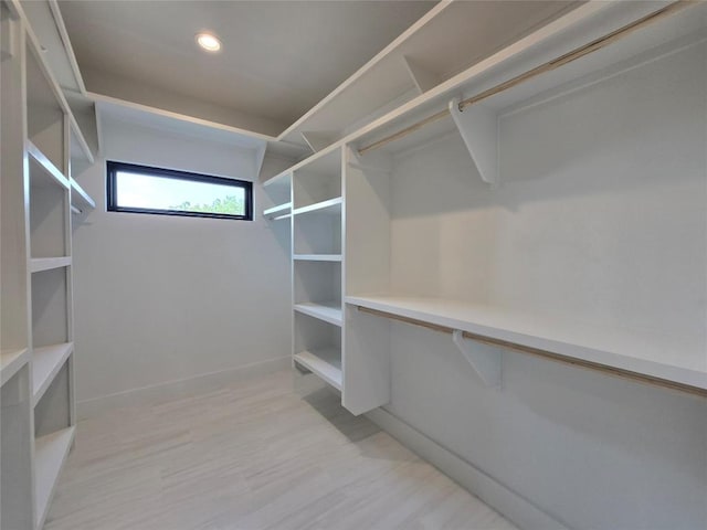 5303 Grover Ave Unit 1, Austin, TX 78756 - walk in closet with light wood finished floors