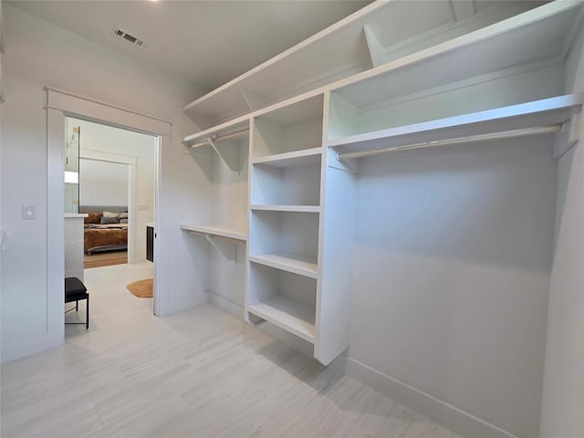 5303 Grover Ave Unit 1, Austin, TX 78756 - spacious closet featuring light wood-type flooring