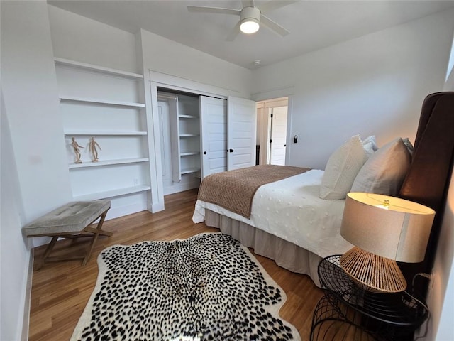 5303 Grover Ave Unit 1, Austin, TX 78756 - bedroom with a closet, wood finished floors, and a ceiling fan