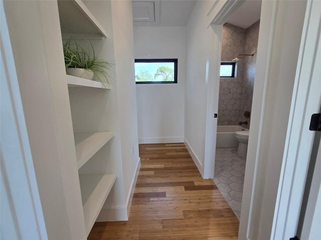 5303 Grover Ave Unit 1, Austin, TX 78756 - hallway with wood finished floors and baseboards