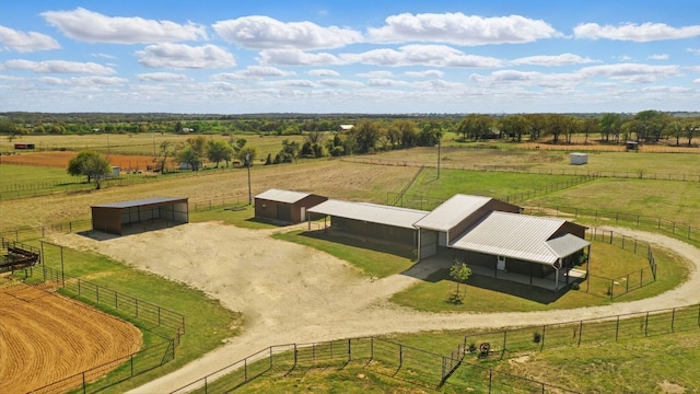 birds eye view of property featuring a rural view