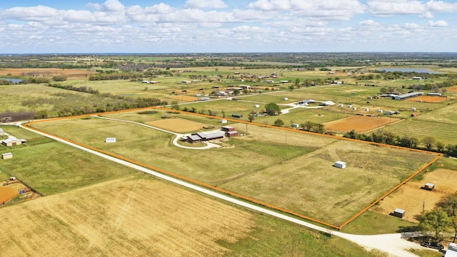 birds eye view of property featuring a rural view