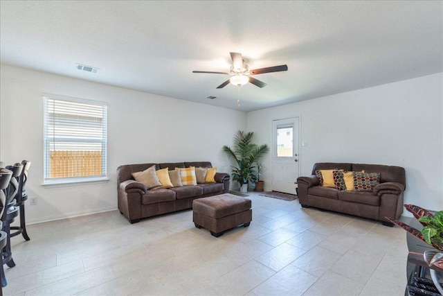 17216 Farmhouse Ln, Elgin, TX 78621 - living area with a ceiling fan and baseboards