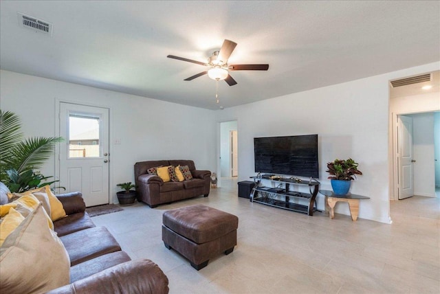 17216 Farmhouse Ln, Elgin, TX 78621 - living room with a ceiling fan and light tile patterned floors