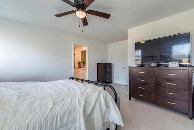 17216 Farmhouse Ln, Elgin, TX 78621 - bedroom with a ceiling fan, connected bathroom, and light tile patterned flooring