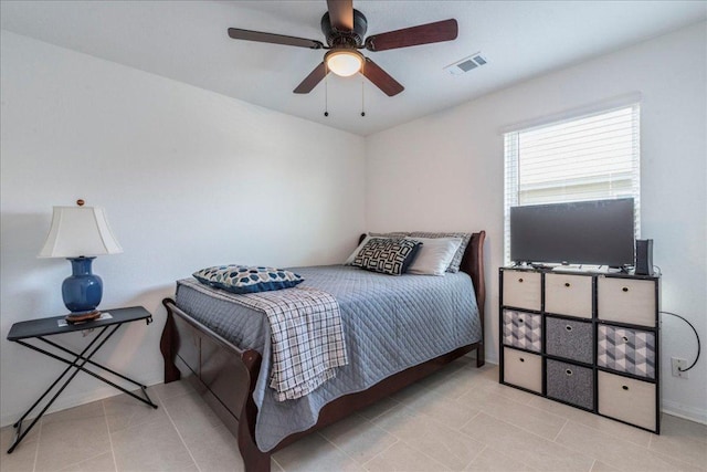 17216 Farmhouse Ln, Elgin, TX 78621 - tiled bedroom with ceiling fan