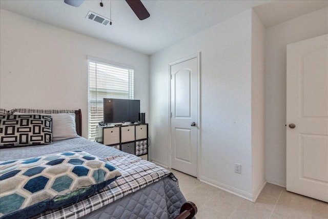 17216 Farmhouse Ln, Elgin, TX 78621 - bedroom featuring tile patterned flooring, baseboards, and ceiling fan